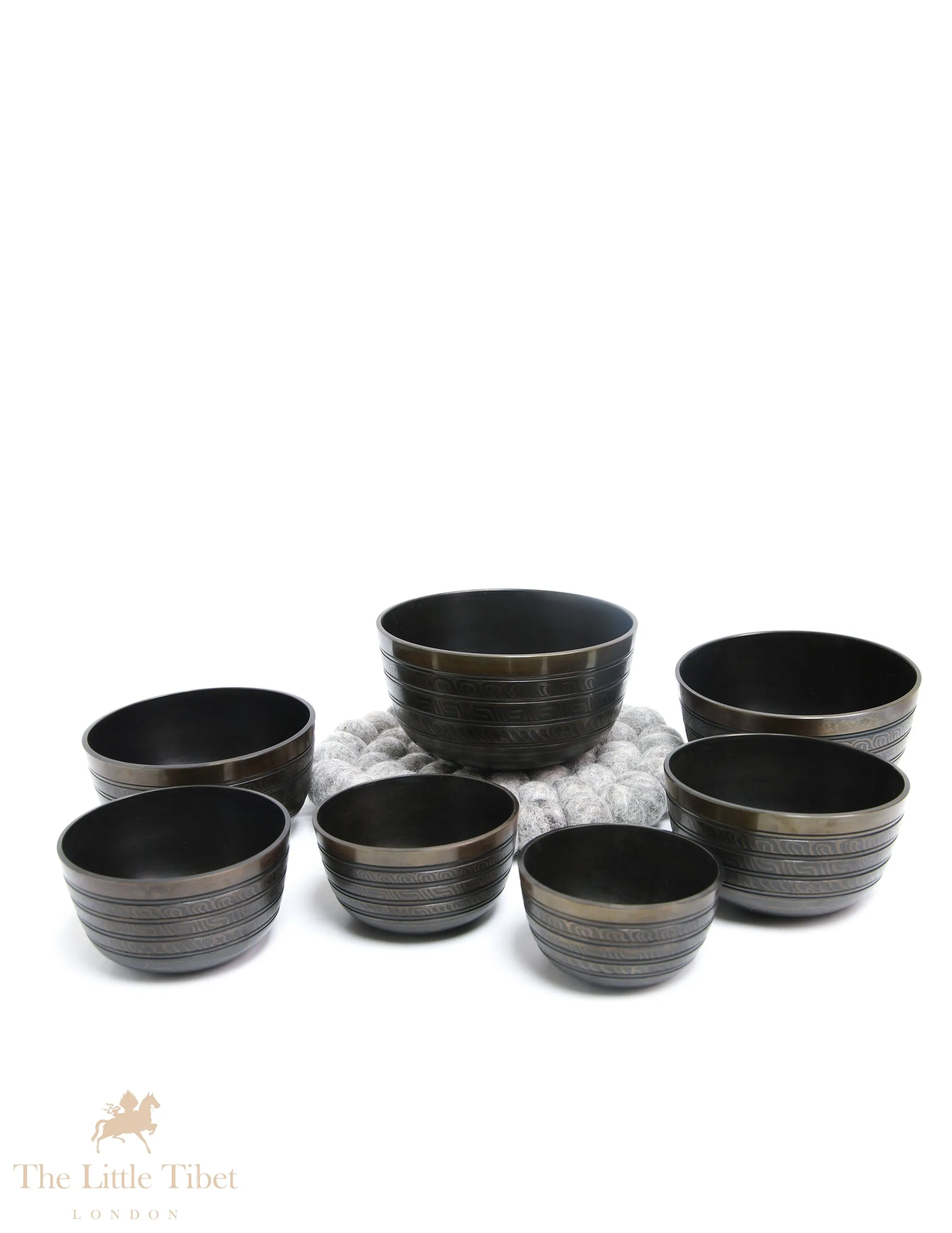 Serenity with the Nestling Seven Chakra Dark Tibetan Singing Bowl Set- 7 Chakra Nestling Dark