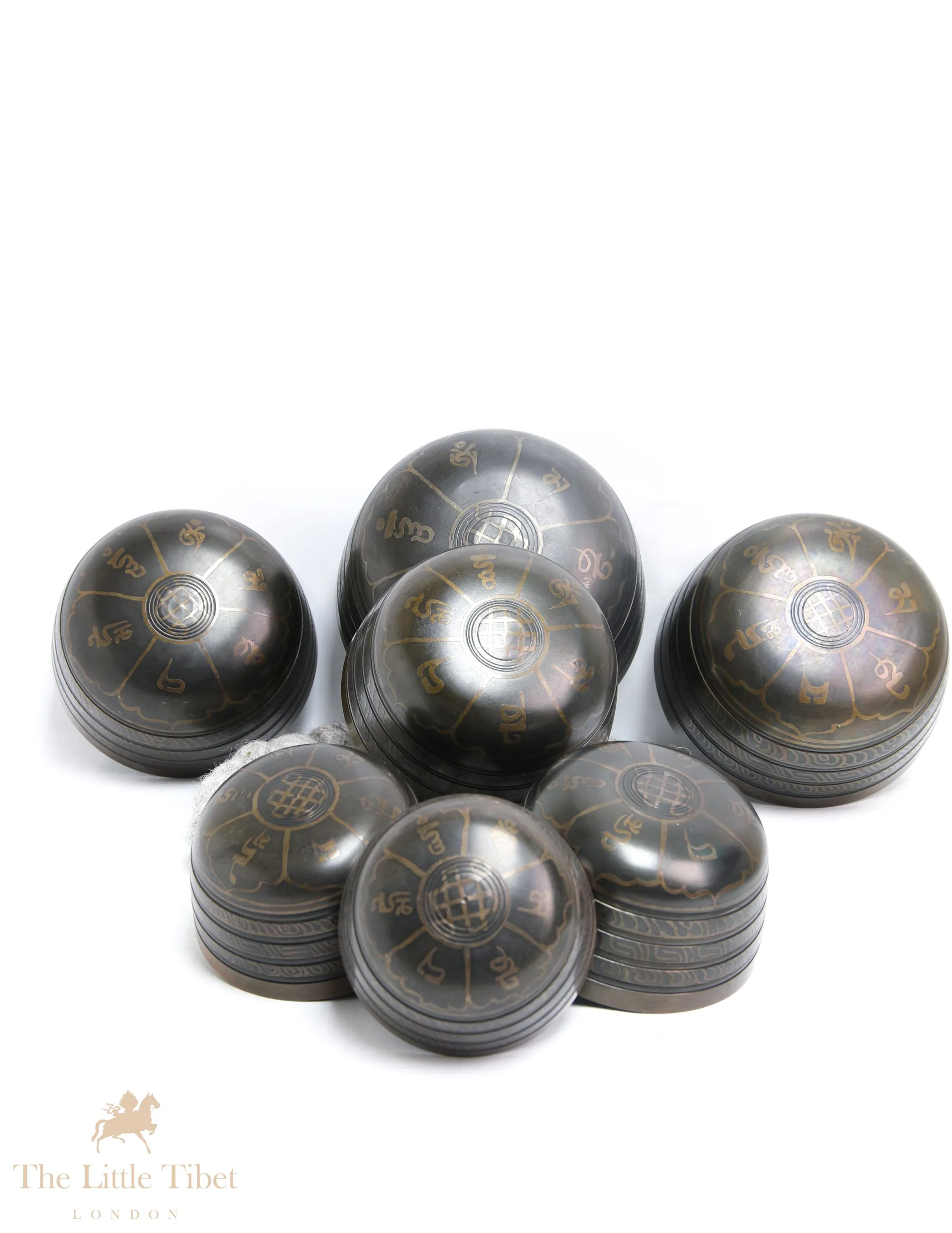 Serenity with the Nestling Seven Chakra Dark Tibetan Singing Bowl Set- 7 Chakra Nestling Dark